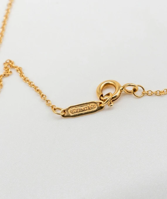 Tiffany  Co. Trefoil Key 18K Yellow Gold Pendant